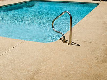 Stamped Vs Brushed Concrete Pool Decks: What's The Difference?