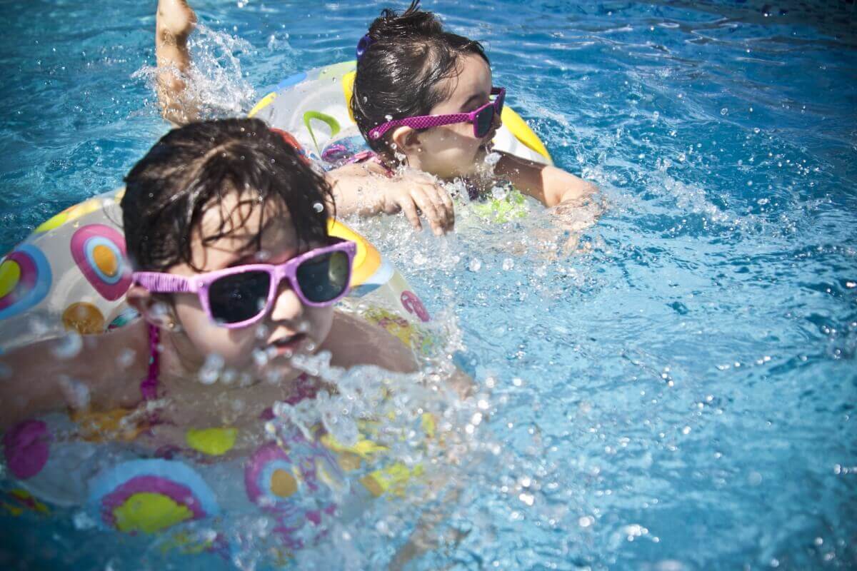 Children Swimming in Clean Pool by GPS Pools