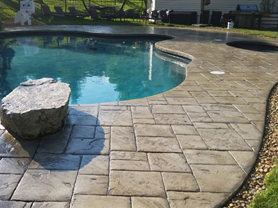 Stamped concrete pool decking option